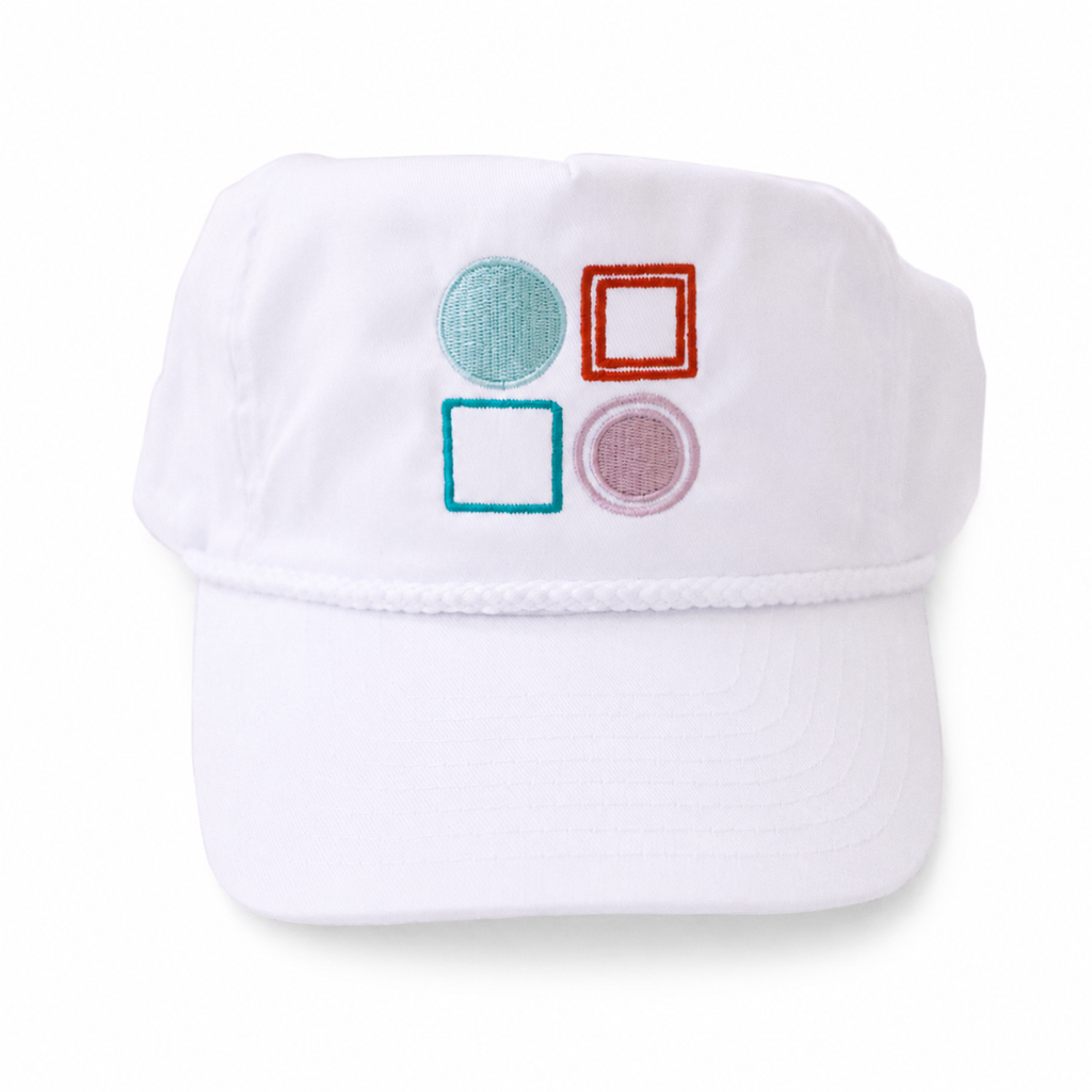 A white baseball cap featuring four embroidered geometric shapes on the front: a teal circle, an orange-outlined square, a teal-outlined square, and a pinkish-purple filled circle.