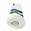A white golf club headcover with blue and green stripes and a green embroidered 'cm' logo on the end cap, shown on a white background.