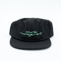 A black snapback cap with 'course management' embroidered in light green script on the front, set against a plain white background.
