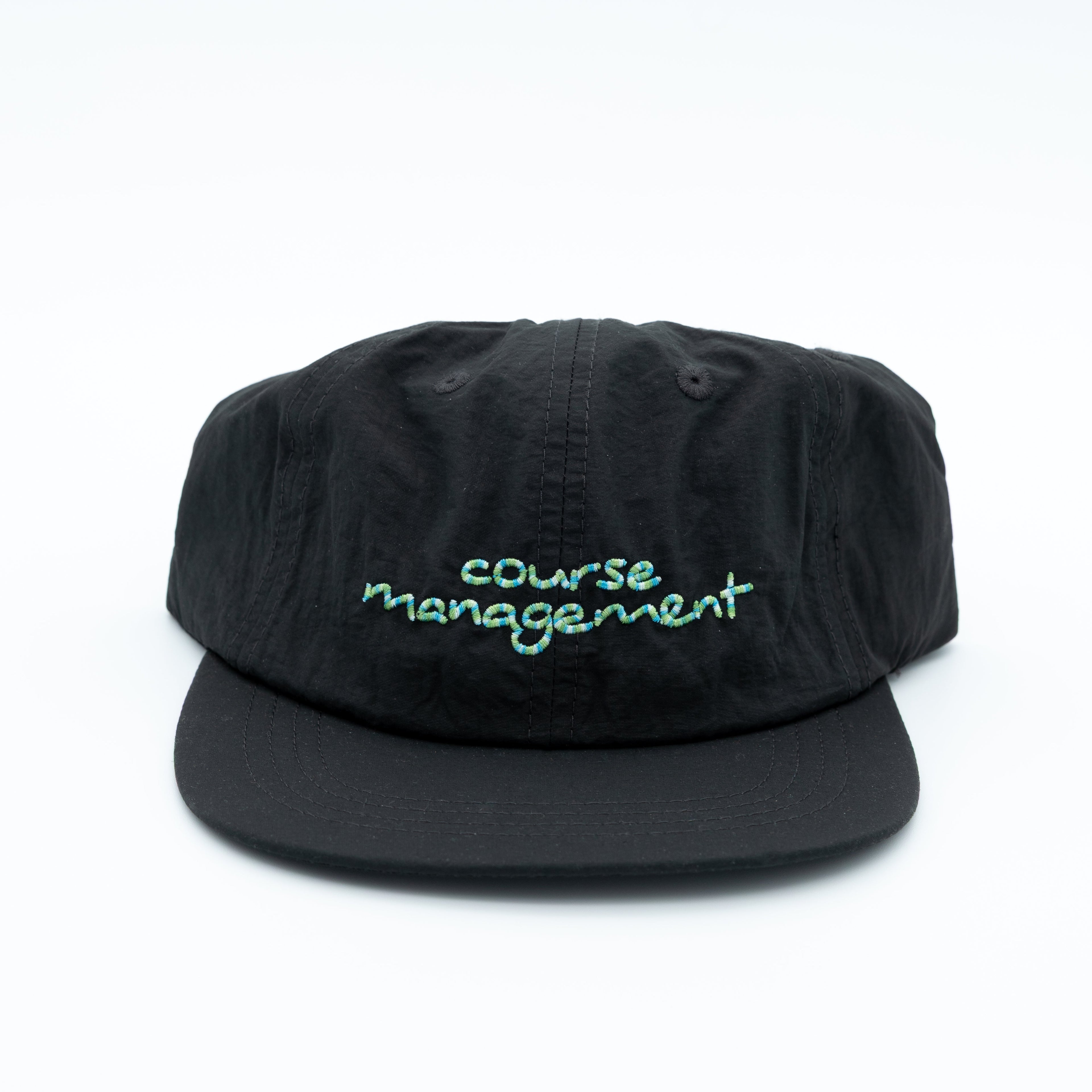 A black snapback cap with 'course management' embroidered in light green script on the front, set against a plain white background.