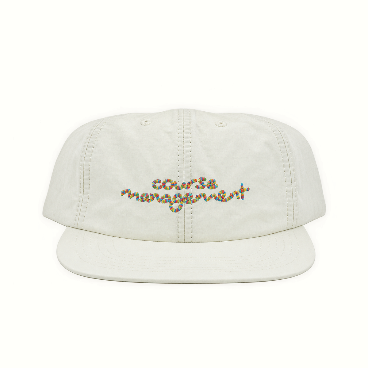 An off-white cotton flat-brim cap with 'course management' embroidered across the front in a multicolor wavy script, set against a plain white background.