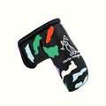 A black golf putter headcover featuring a colorful abstract topography pattern in green, orange, light blue, white, and purple, with a white line-art graphic of a golfer and the text 'course management' on the side.